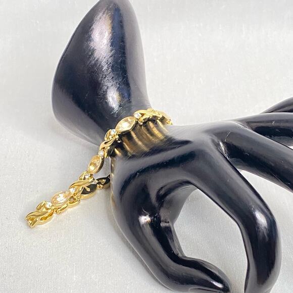 XO Bracelet Gold Tone Chain Links With Clear Round And Oval Stones Folding Clasp - Picture 4 of 10